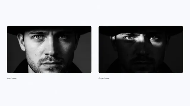 A man's portrait relit so that only his eyes and cheekbones catch the light